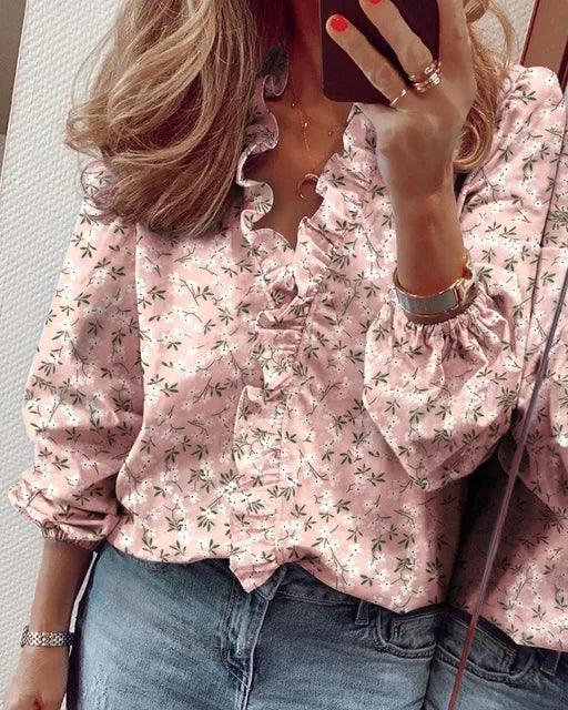Casual yet elegant women's long-sleeve V-neck top featuring delicate ruffles for spring and summer.