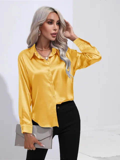 Women's fashionable satin long sleeve blouse. Elegant loose fit top, perfect for versatile looks.