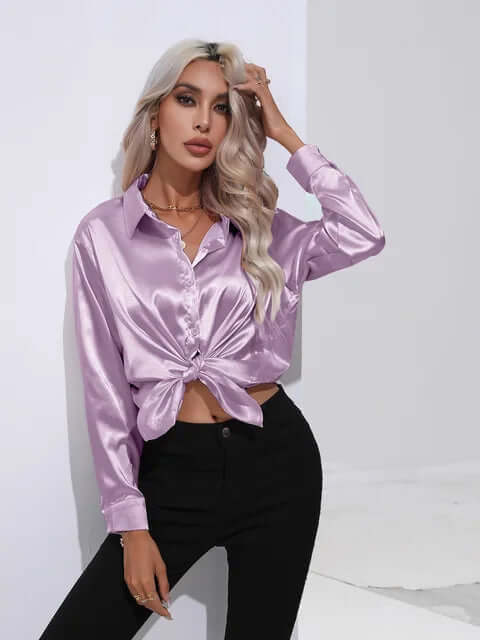 Chic & elegant women's satin blouse. Loose fit long sleeve top for sophisticated fashion.
