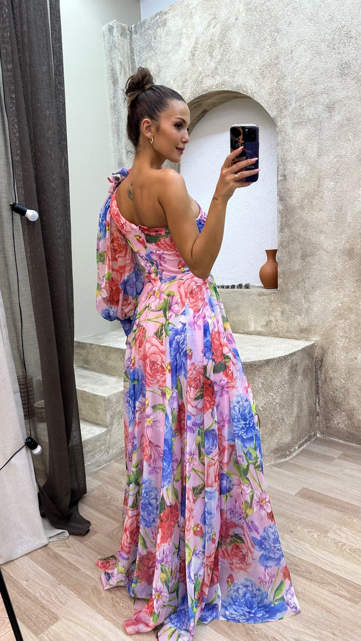 Vibrant flowy one-shoulder long maxi dress for women, ideal for elegant summer events & party fashion.