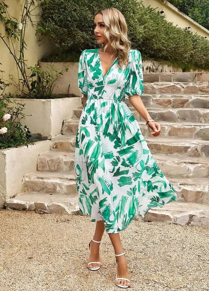 Women's elegant puff sleeve midi dress, cinched waist, V-neck, abstract print. Summer/spring casual.