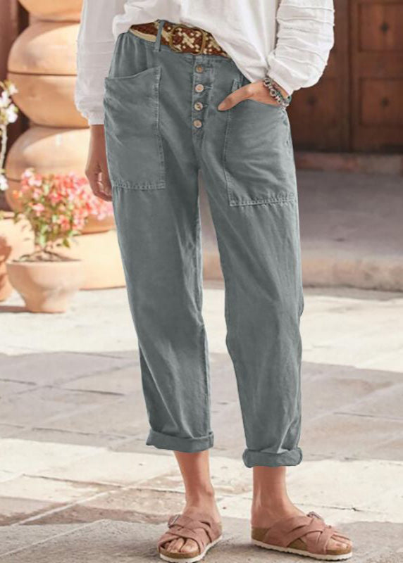 Side profile of women's comfortable wide-leg trousers, showcasing the relaxed fit and graceful movement.