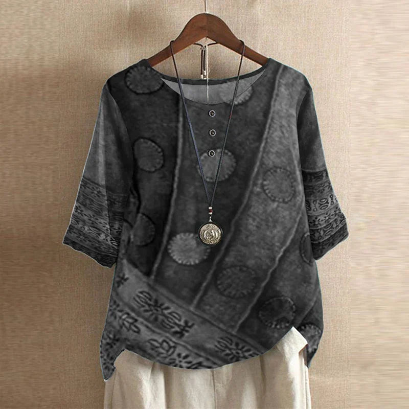 Vintage-style women's blouse with elegant detailing, a chic retro top for feminine wear.