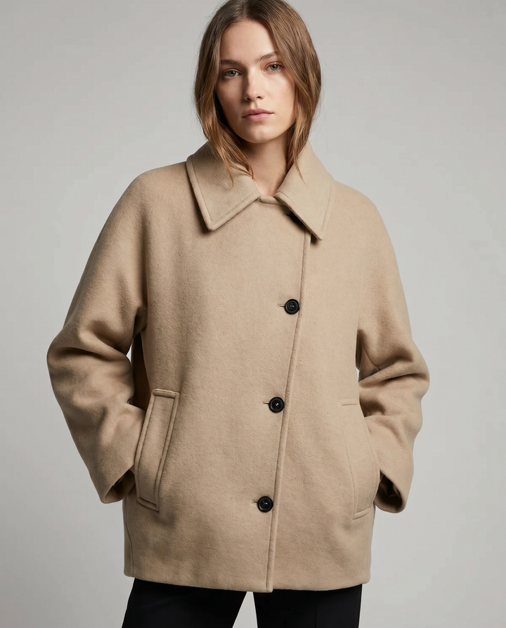 Women's elegant short coat jacket in a chic style, perfect for winter fashion & layering.