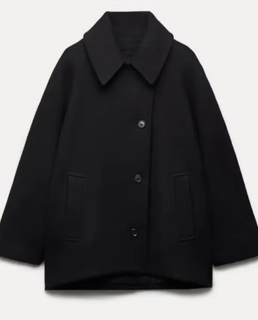 Modern women's short coat, an elegant jacket for a chic everyday style and winter layering.