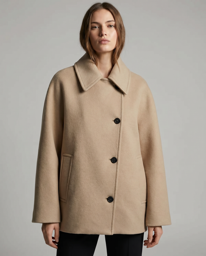 Fashionable brown short jacket for women, offering an elegant & chic winter fashion statement.