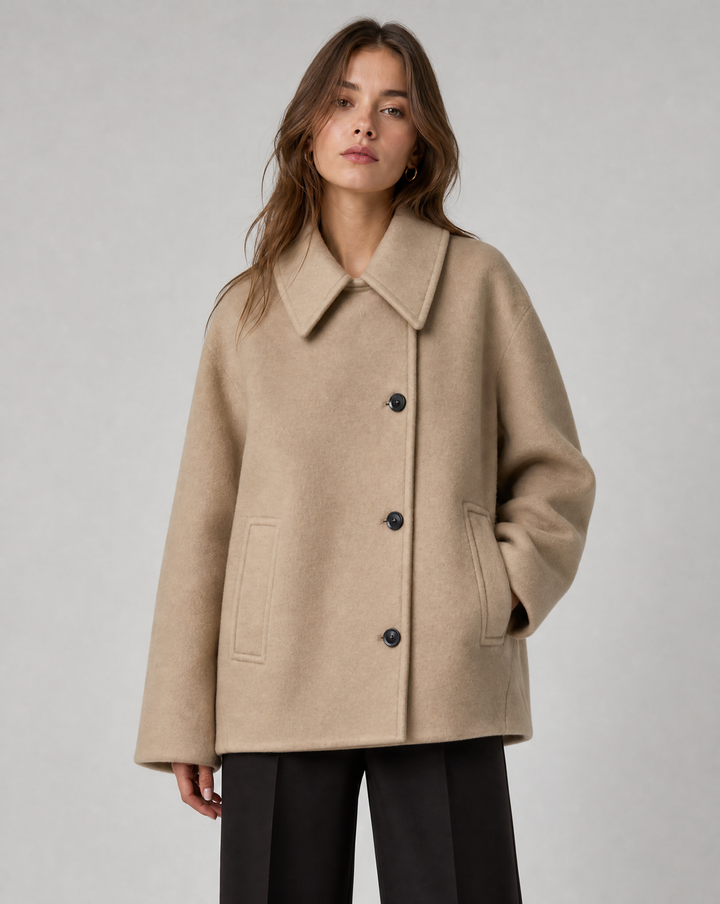 Chic women's short coat, an elegant jacket for sophisticated layering and everyday style.