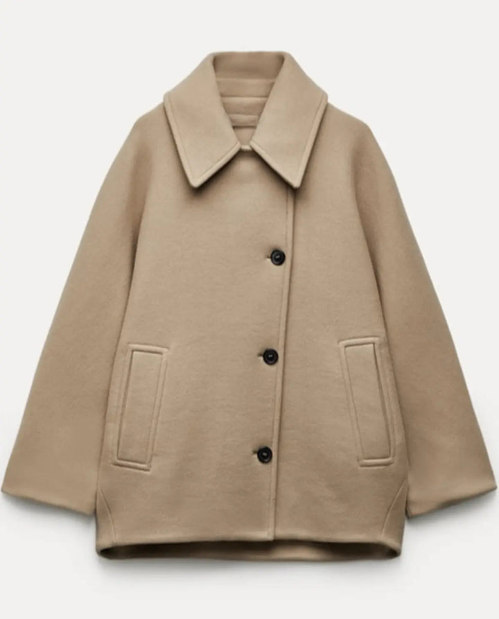 Stylish women's elegant short coat, ideal for winter fashion & versatile everyday outerwear.