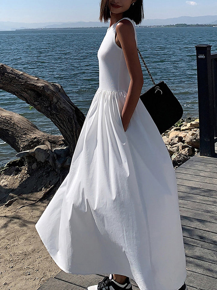 Elegant black sleeveless maxi dress for women, ideal for formal occasions, summer parties, or sophisticated evenings.