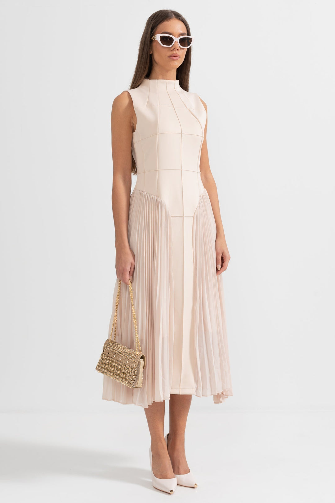 Chic women's beige sleeveless pleated midi dress, an elegant choice for cocktail events & formal wear.
