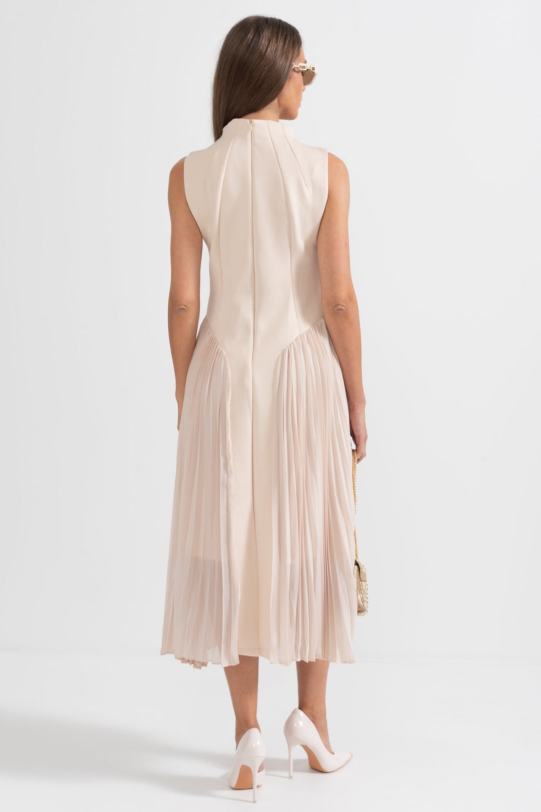 Stylish sleeveless pleated midi cocktail dress for women, perfect for evening wear & formal occasions.