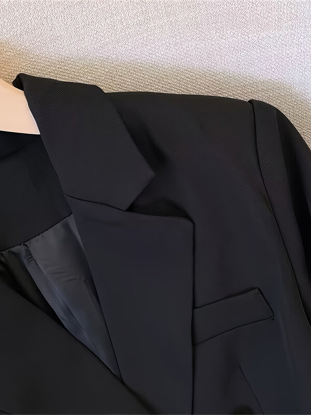 Versatile women's slim blazer with elegant golden buttons, perfect for business casual or formal office settings.
