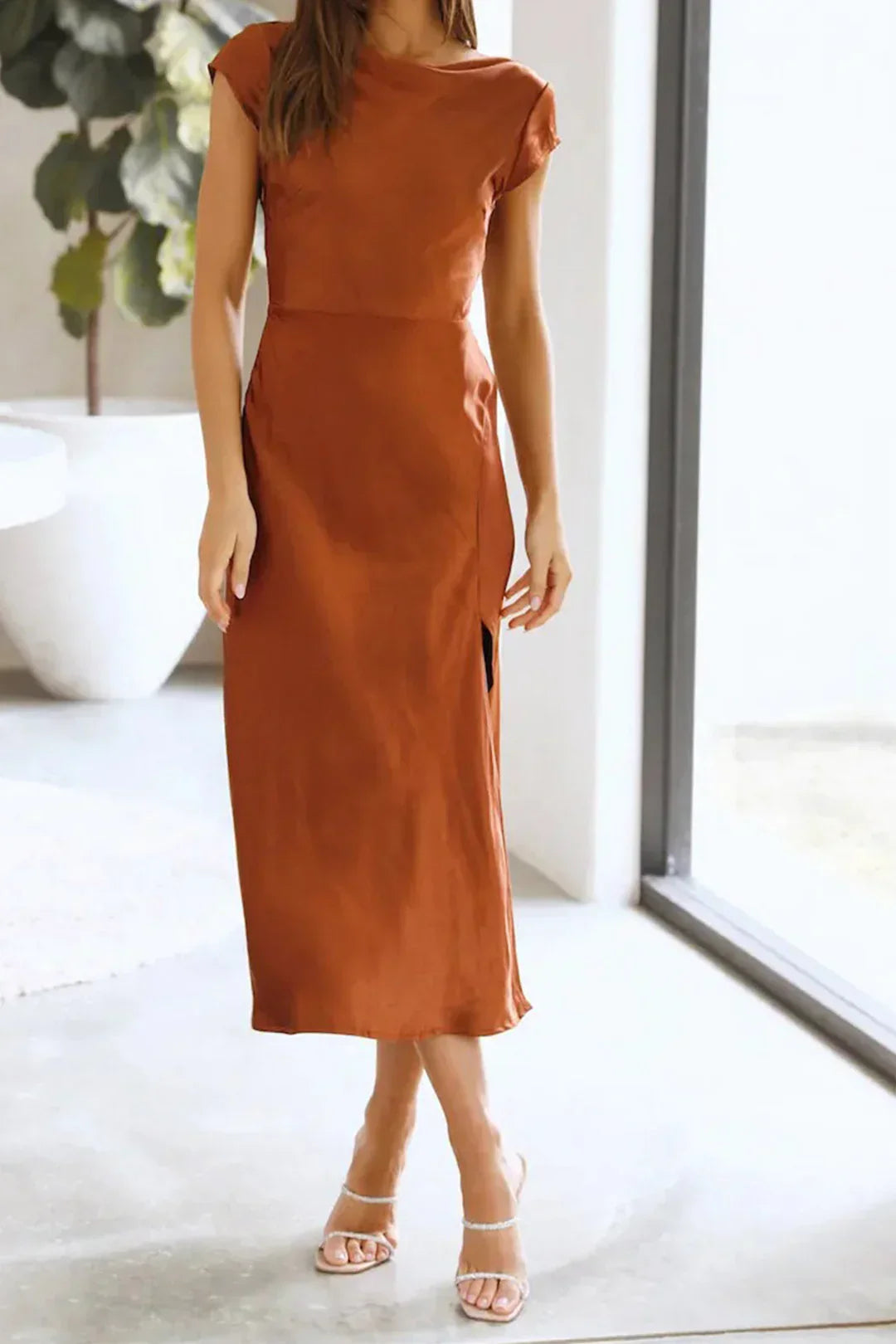Sophisticated women's formal midi slip dress. Ideal elegant evening wear or cocktail attire for any special event.