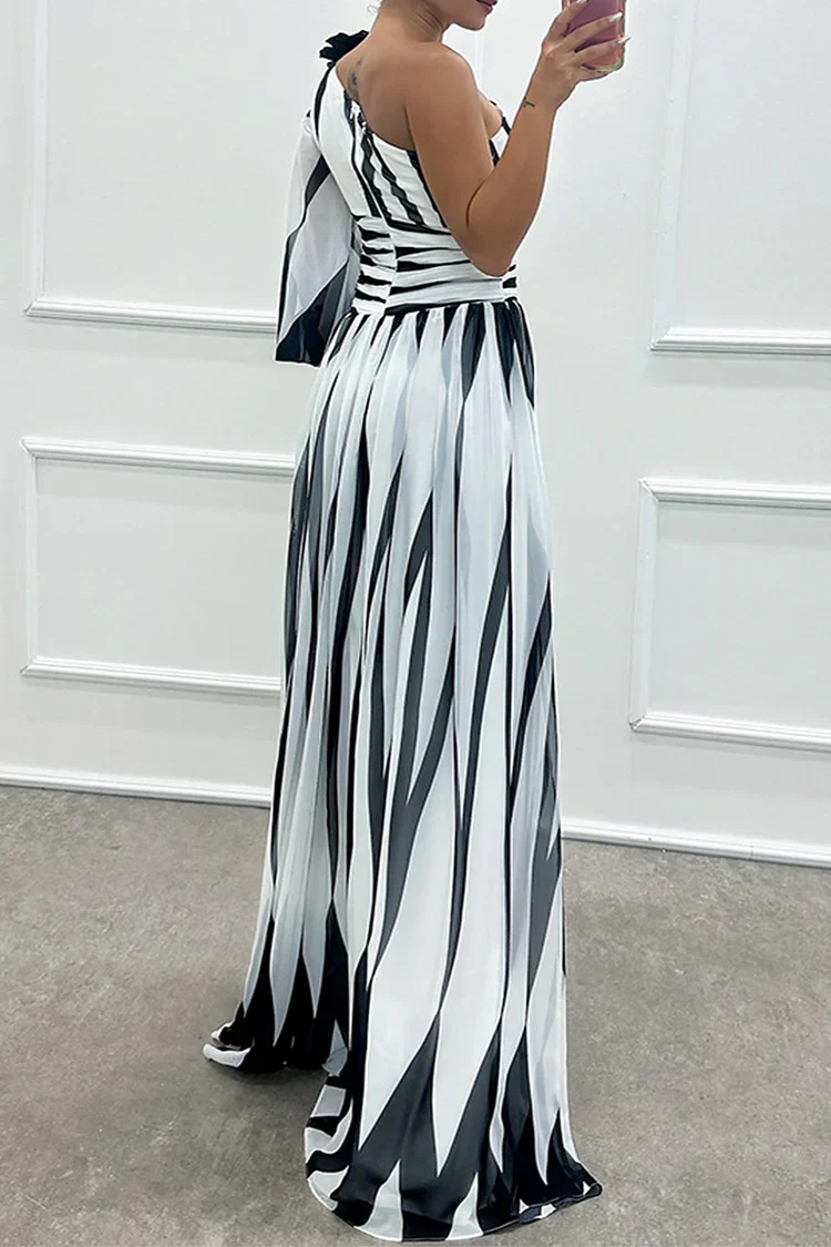 Flowy striped one-shoulder maxi dress for women, offering elegant comfort for beach holidays & summer fashion.