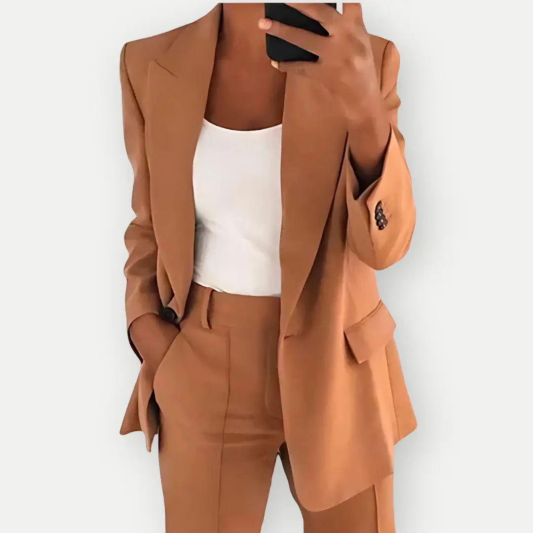 Smart women's tailored blazer & trousers set, embodying office fashion & professional business attire.