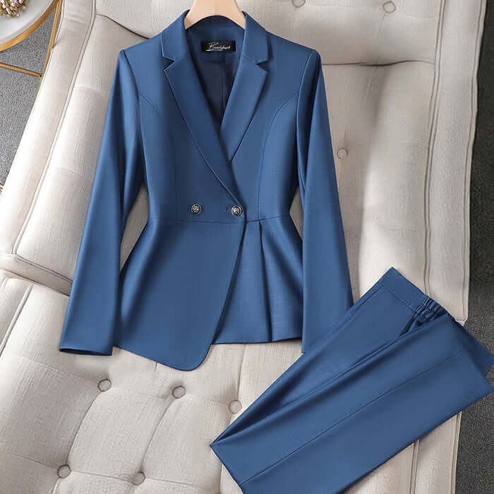 Women's elegant tailored suit set with a professional blazer and matching trousers, ideal for business wear.