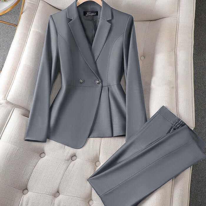 Stylish women's tailored pantsuit available in blue, gray, or black. Perfect two-piece professional workwear.