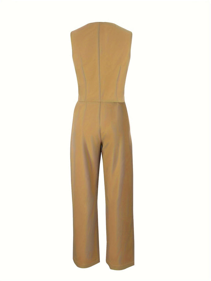 Dynamic shot of a woman wearing a tailored vest and wide-leg pant suit, embodying power dressing.