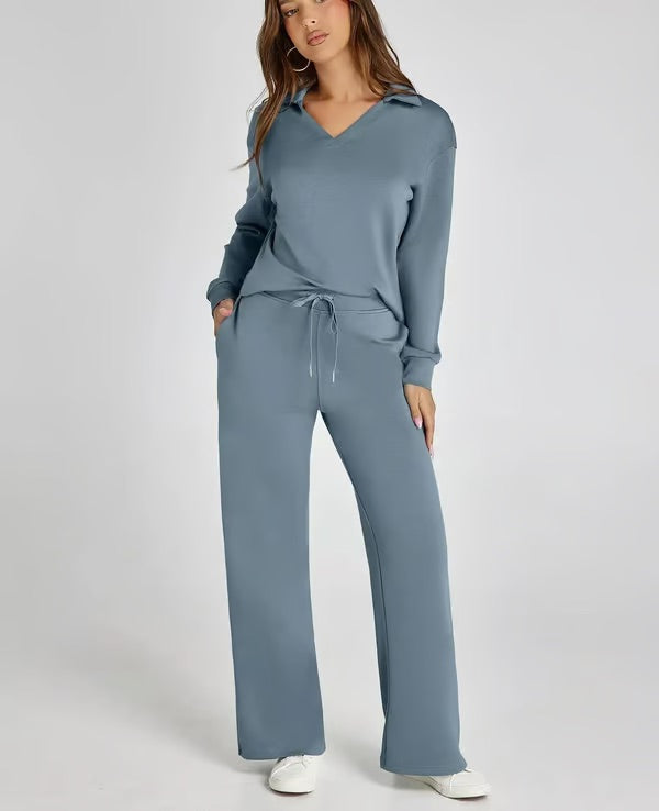 Elegant women's two-piece set featuring a collared shirt & comfy drawstring trousers.