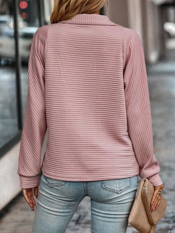 Fashionable women's V-neck half-zip jumper. Elegant long-sleeve soft knit sweater, great for autumn winter.