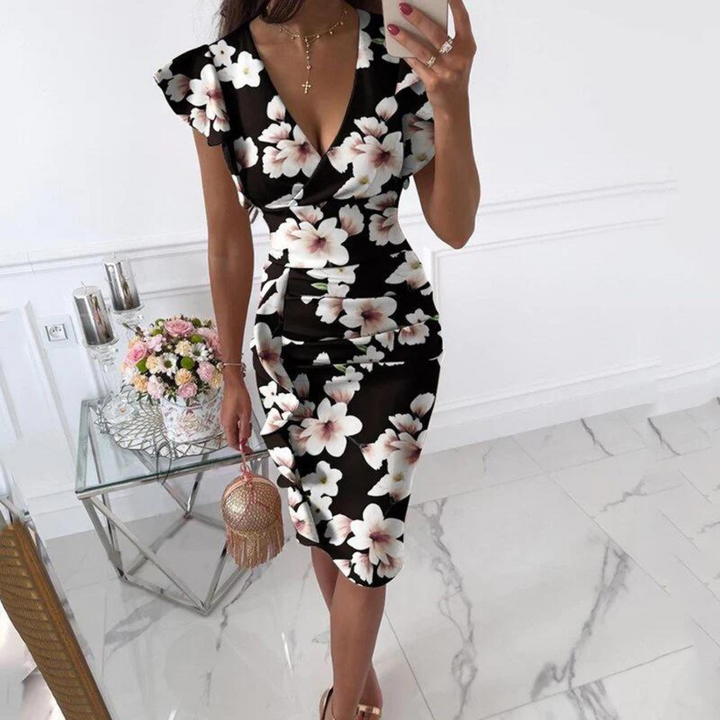 Women's elegant V-neck midi dress with stylish pleated sleeves, perfect for summer occasions.