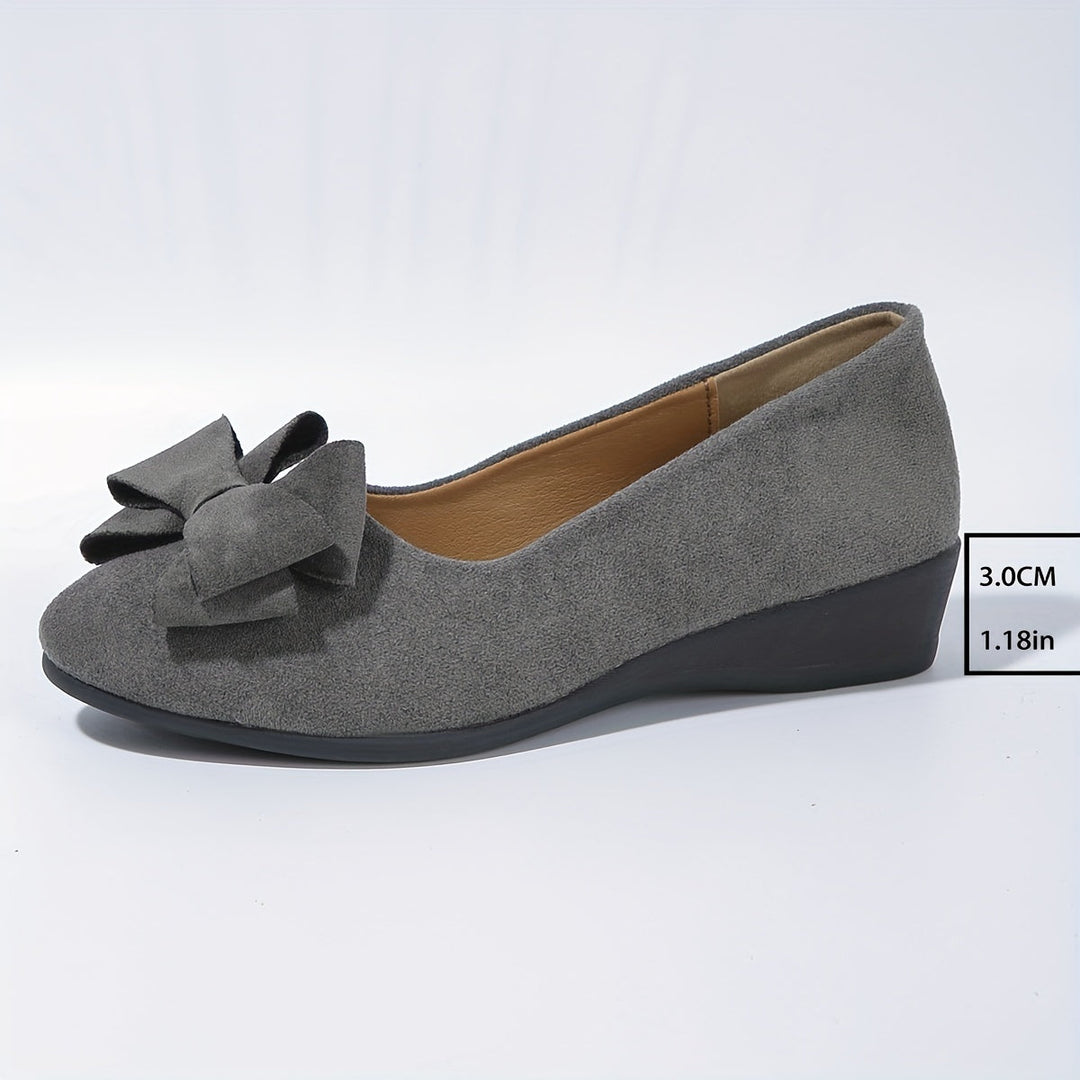 Stylish women's slip-on wedge ballet flats, perfect for work or play.