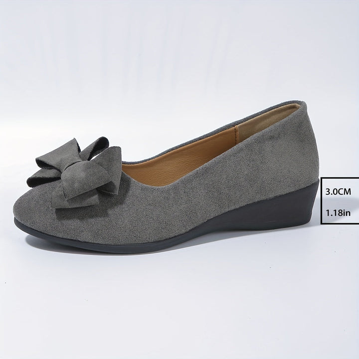 Stylish women's slip-on wedge ballet flats, perfect for work or play.