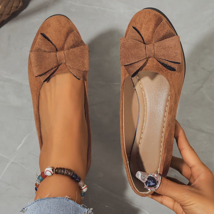 Comfortable women's wedge ballet flats, everyday elegance with a bow.