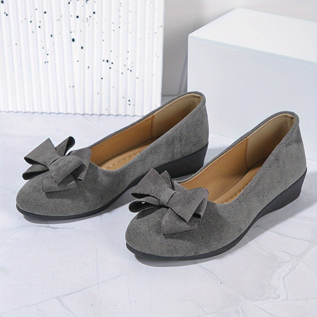 Versatile women's wedge slip-on shoes, everyday comfort with a bow.