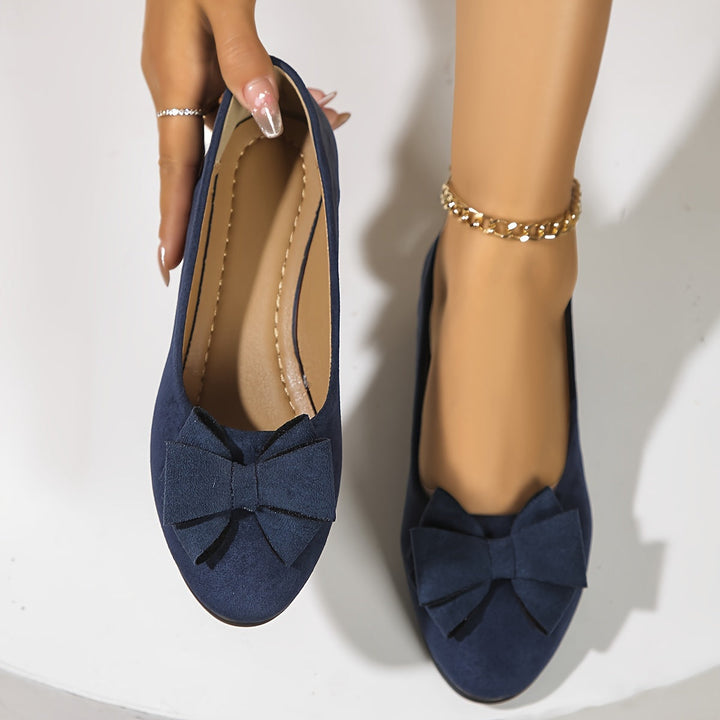 Casual women's wedge ballet flats, offering comfort and charming bow.