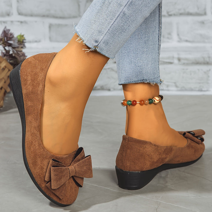 Women's comfortable wedge shoes, ballet flat style with a lovely bow.