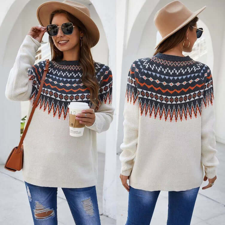 Women's elegant white knitted sweater with long sleeves and a round neck, perfect for cozy fall & winter fashion.