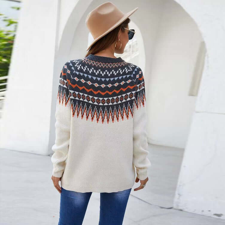 Versatile women's long sleeve round neck white knit sweater. Perfect for casual or elegant fall & winter style.