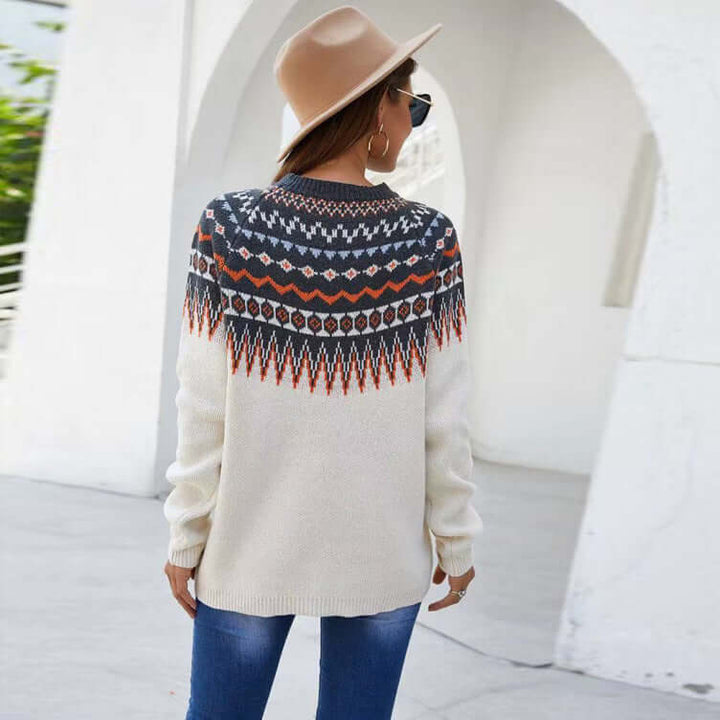 Versatile women's long sleeve round neck white knit sweater. Perfect for casual or elegant fall & winter style.