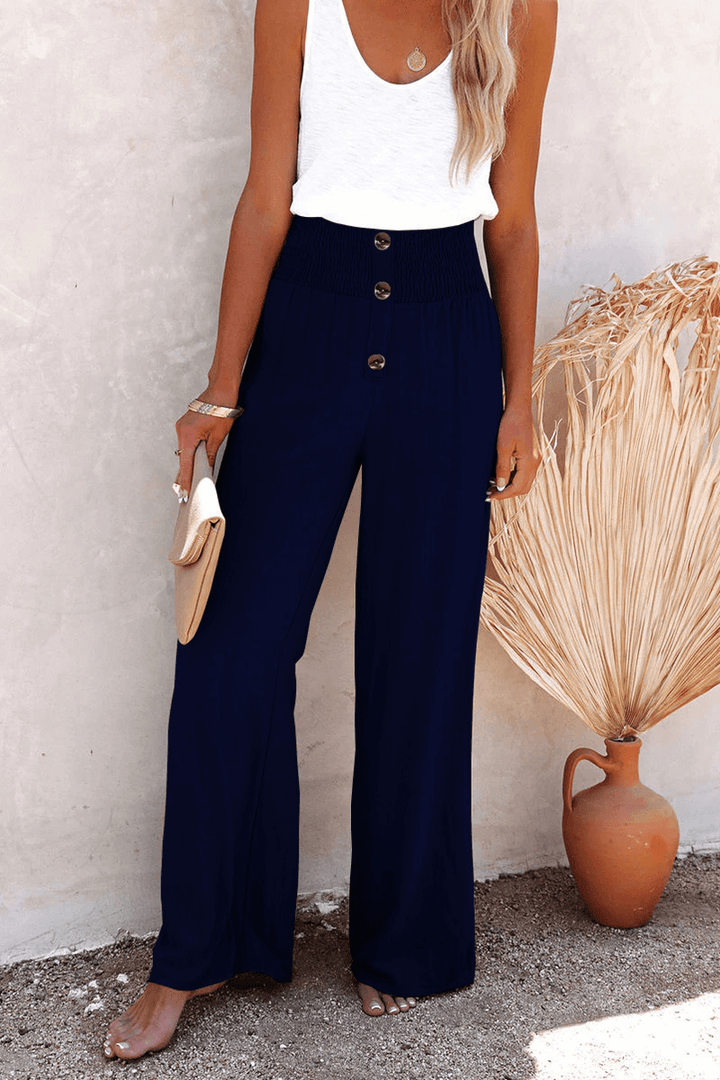 Women's comfortable wide leg polyester trousers, elegant design with front button closure, suitable for spring.