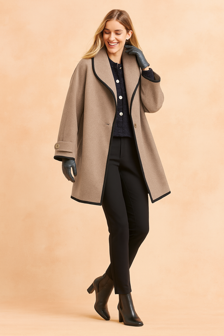 Relaxed fit women's elegant jacket with contrasting trim, ideal for chic and stylish fall or spring outerwear.