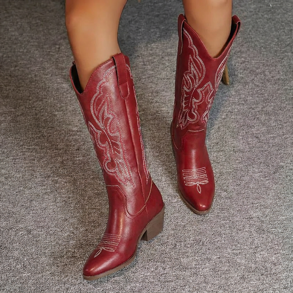 Women's embroidered cowgirl boots. Knee-high western style with block heel & pointed toe. Fashionable.