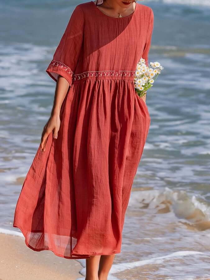 Elegant women's boho embroidered loose cotton linen dress, ideal for breezy summer vacation.