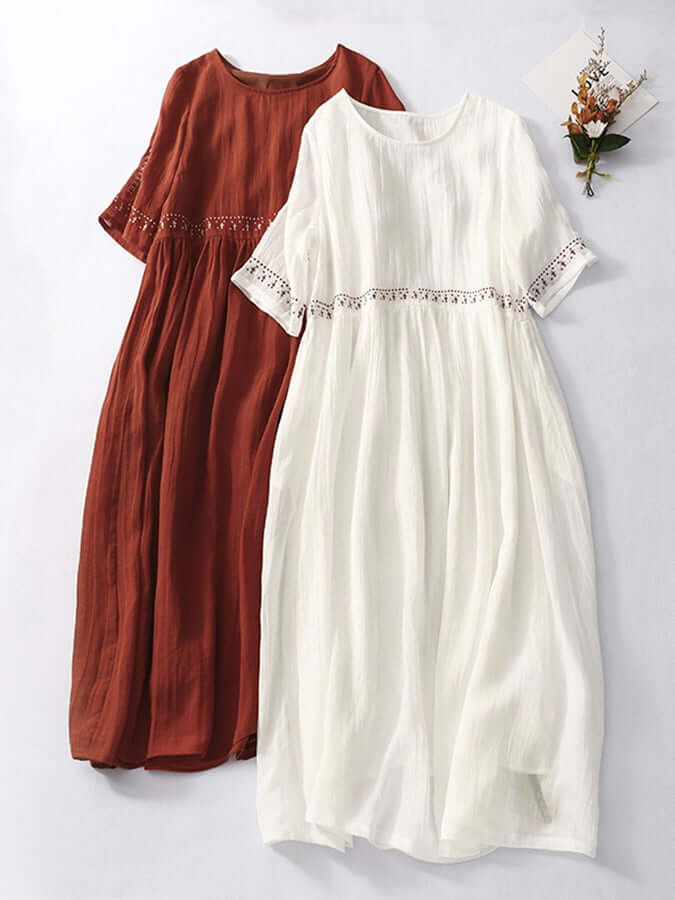 Comfortable women's loose cotton linen summer dress with delicate embroidery.
