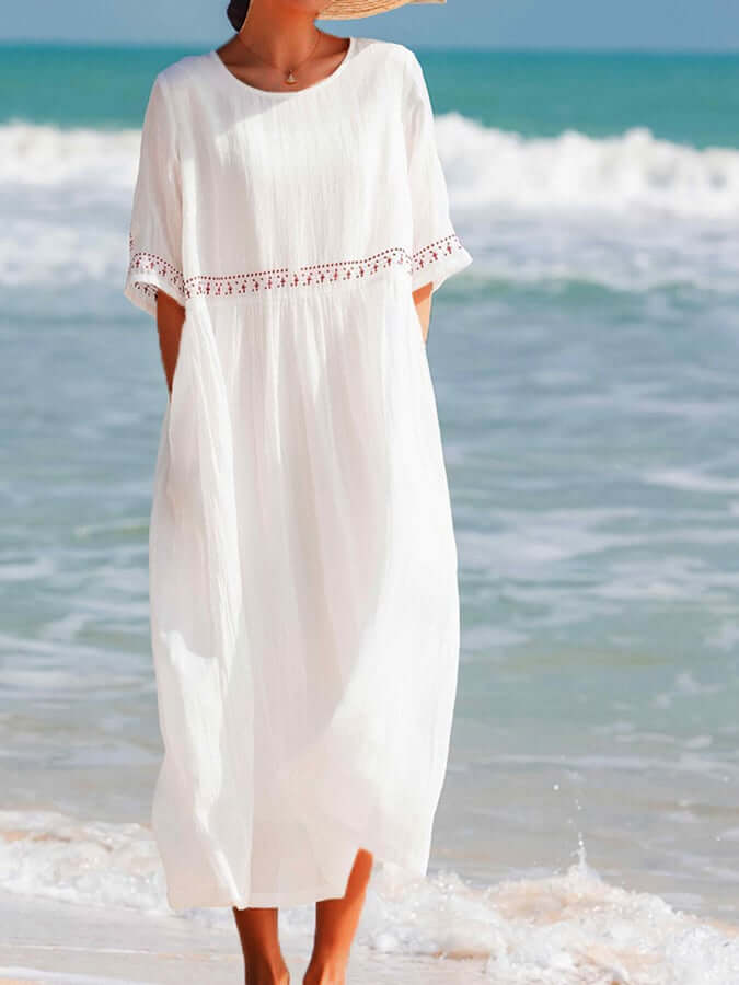Breezy women's embroidered cotton linen dress, a chic boho-inspired option for summer holidays.