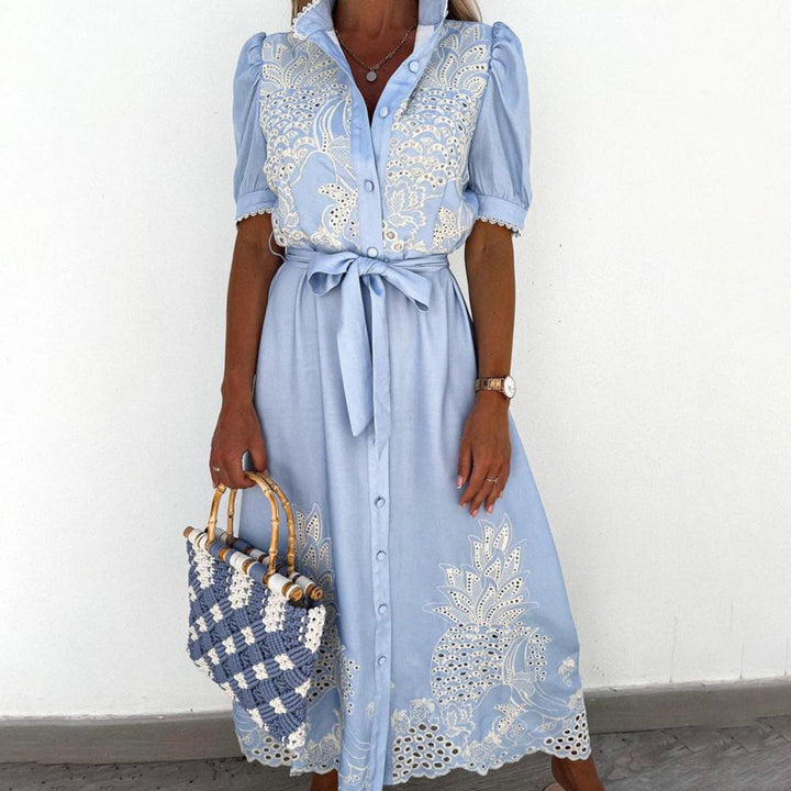 White embroidered maxi dress, sleeveless, ideal for bohemian summer days and special occasions.