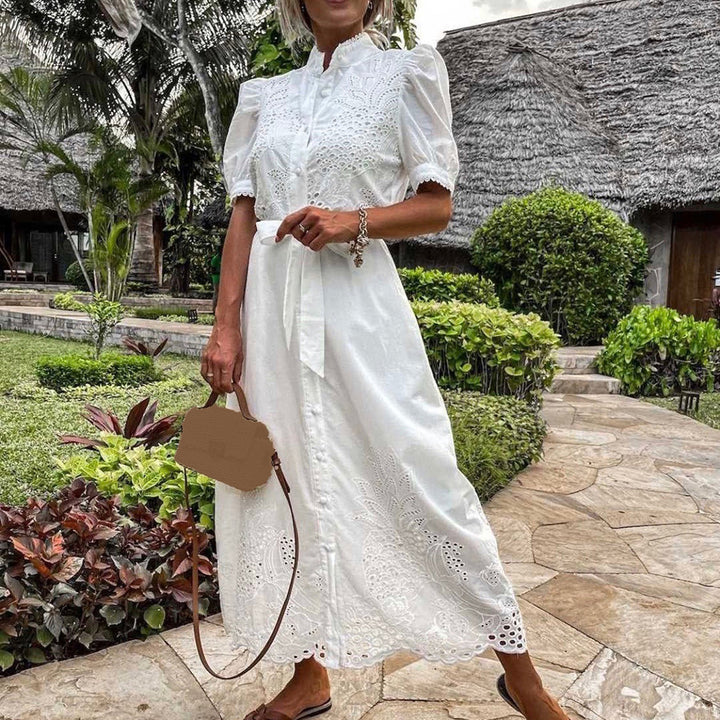 Bohemian embroidered maxi dress, comfortable and flowing, great for summer vacations and beach outings.