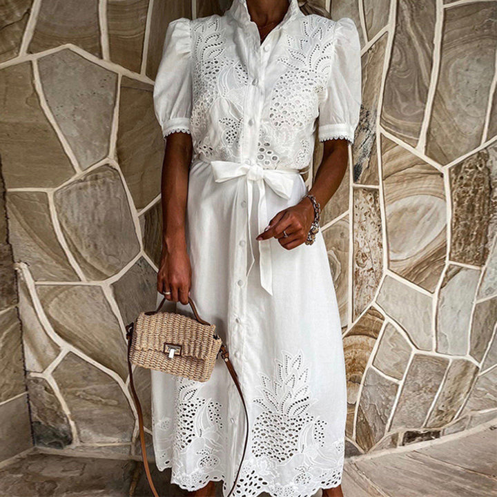 Sleeveless white embroidered maxi dress, lightweight & elegant, ideal for summer, vacation, or special occasions.