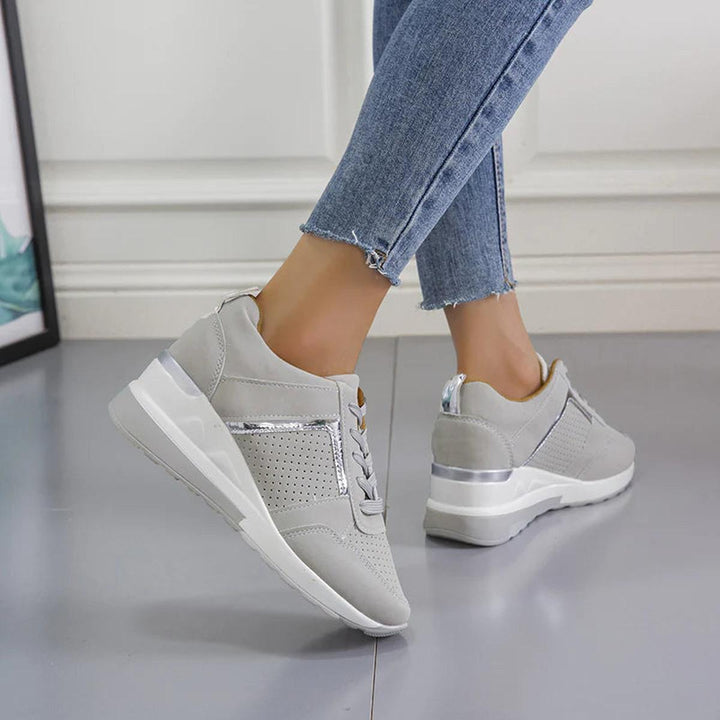 Stylish women's comfort wedge sneakers, perfect everyday casual footwear with a subtle lift.