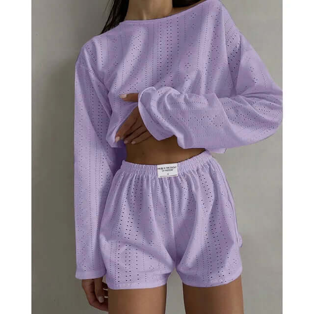 Women's eyelet knit lounge set: crop top & high-waisted shorts. Comfortable summer casual wear.