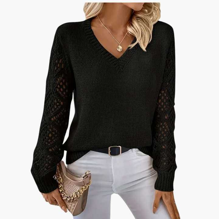 Textured fine knit V-neck sweater for women. Long sleeves, ideal for layering and transitional seasons.