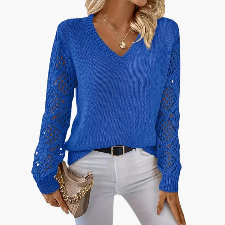 Stylish women's V-neck long sleeve knit sweater. Fine texture, great for casual or transitional outfits.