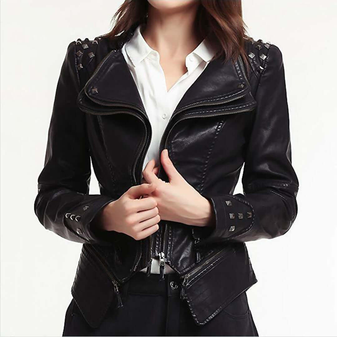 Women's fitted black leather biker jacket with silver stud detailing and rebel style.