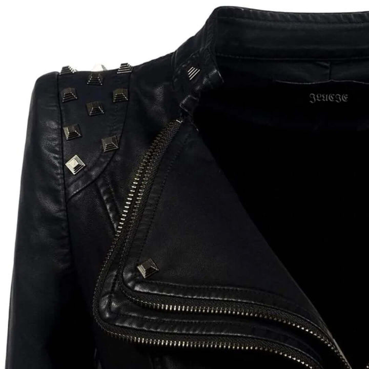 Fashionable women's fitted leather jacket with prominent studs, ideal for a punk biker look.
