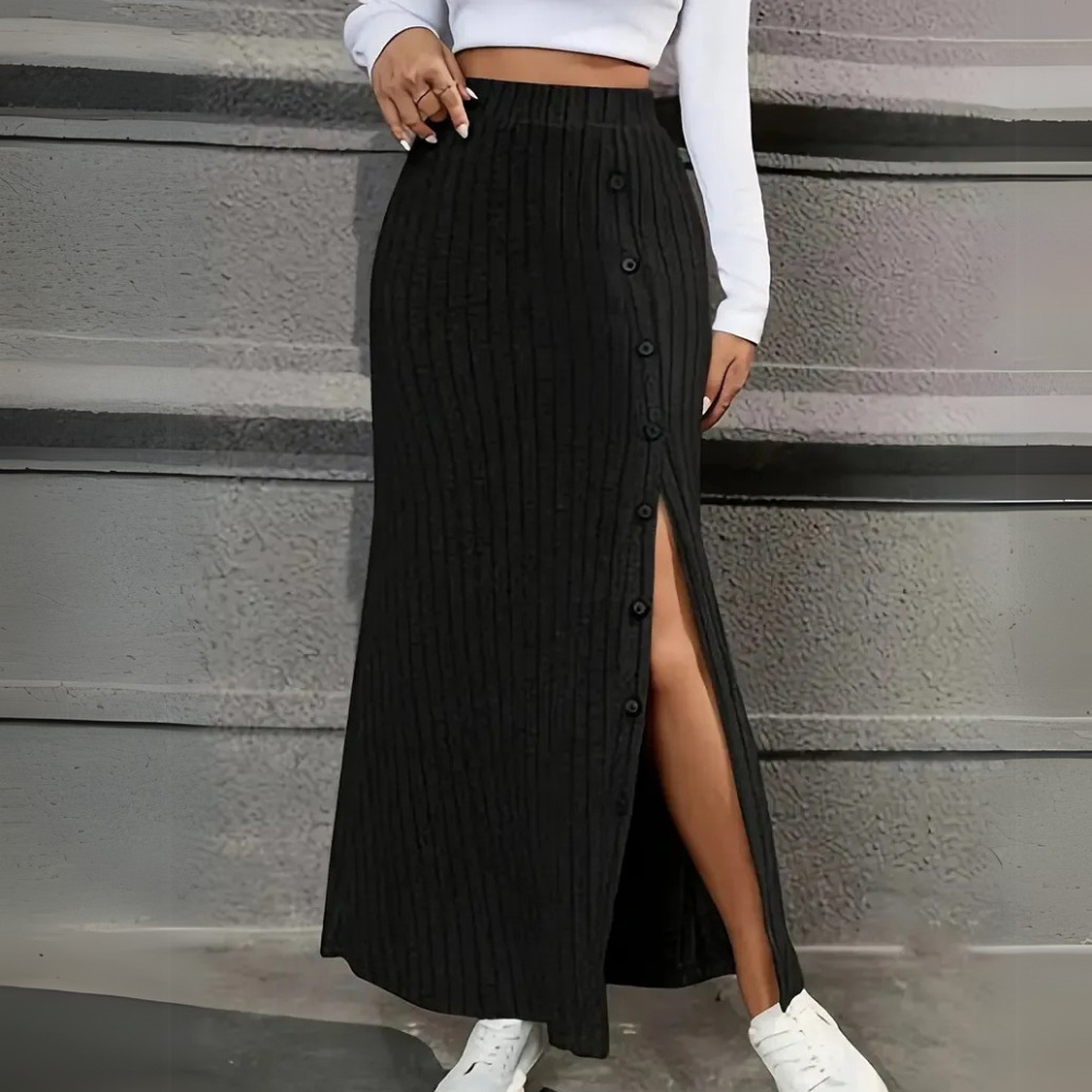 Women's fitted maxi skirt with an elegant side slit, perfect for versatile styling.